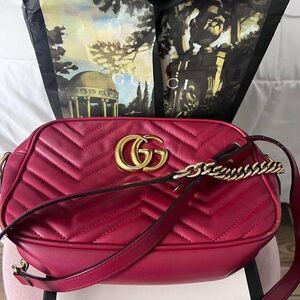 Gucci Red Crossbody Bag with Iconic GG Logo and Chain Strap